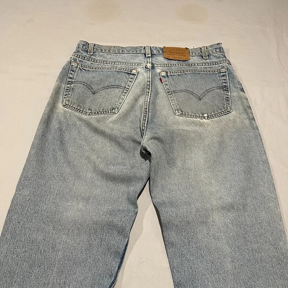 VTG Levis 550 Men Blue Light Wash Destressed Relaxed Fit Tapered Leg Jeans 38x34